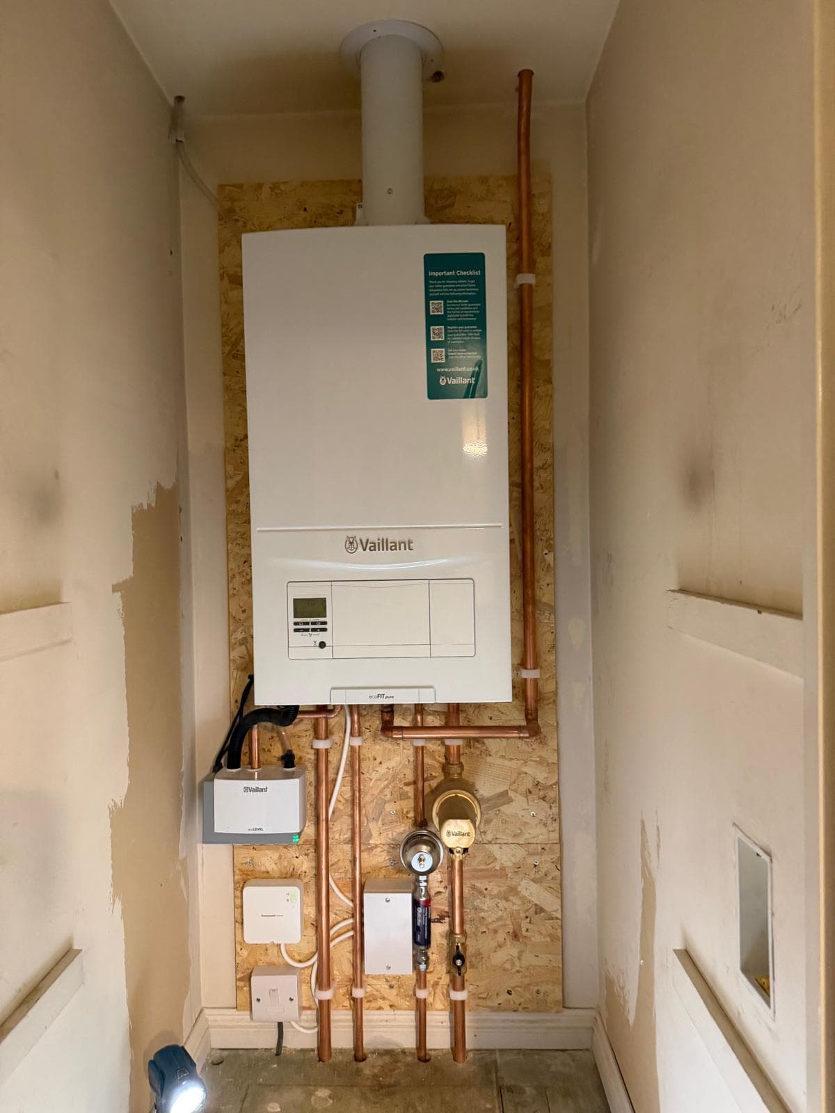 Gas boiler installed in an airing cupboard by Linked Plumbing & Heating